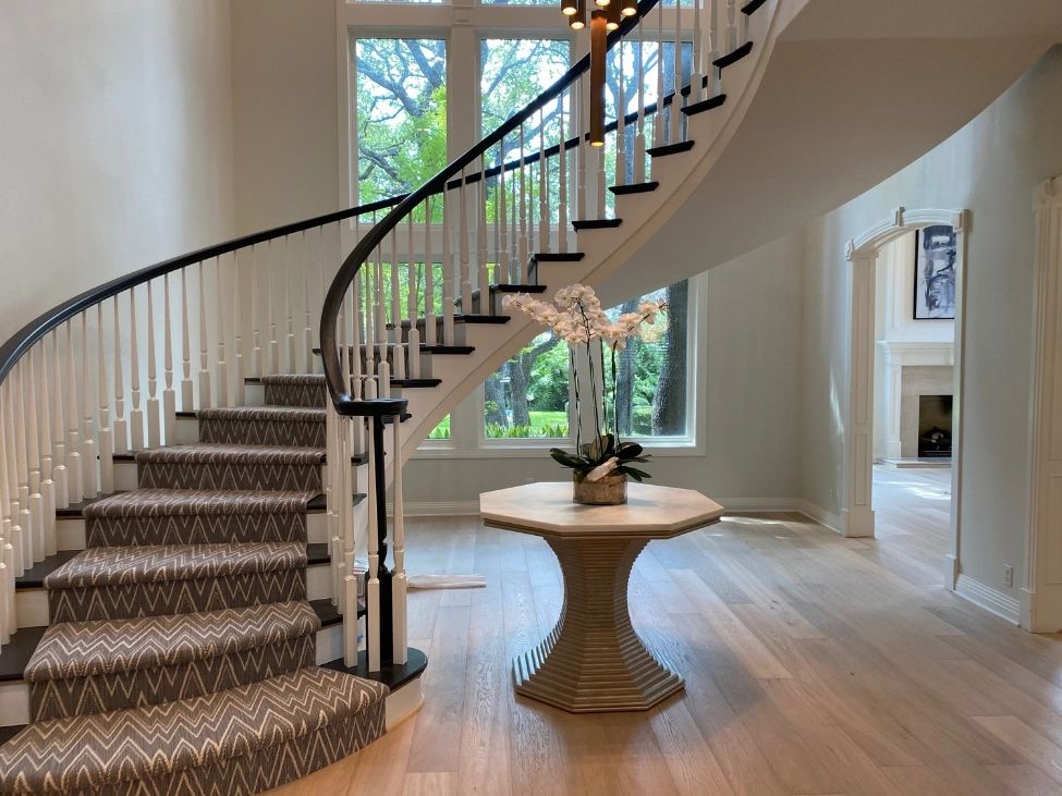 Luxury residential foyer with carpet runner