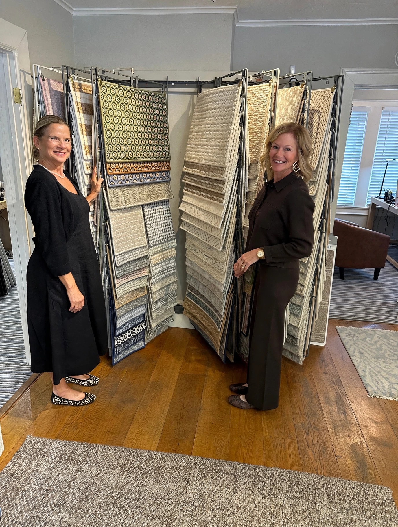 Rug rack display at Benson Carpet and Floors showroom, Austin